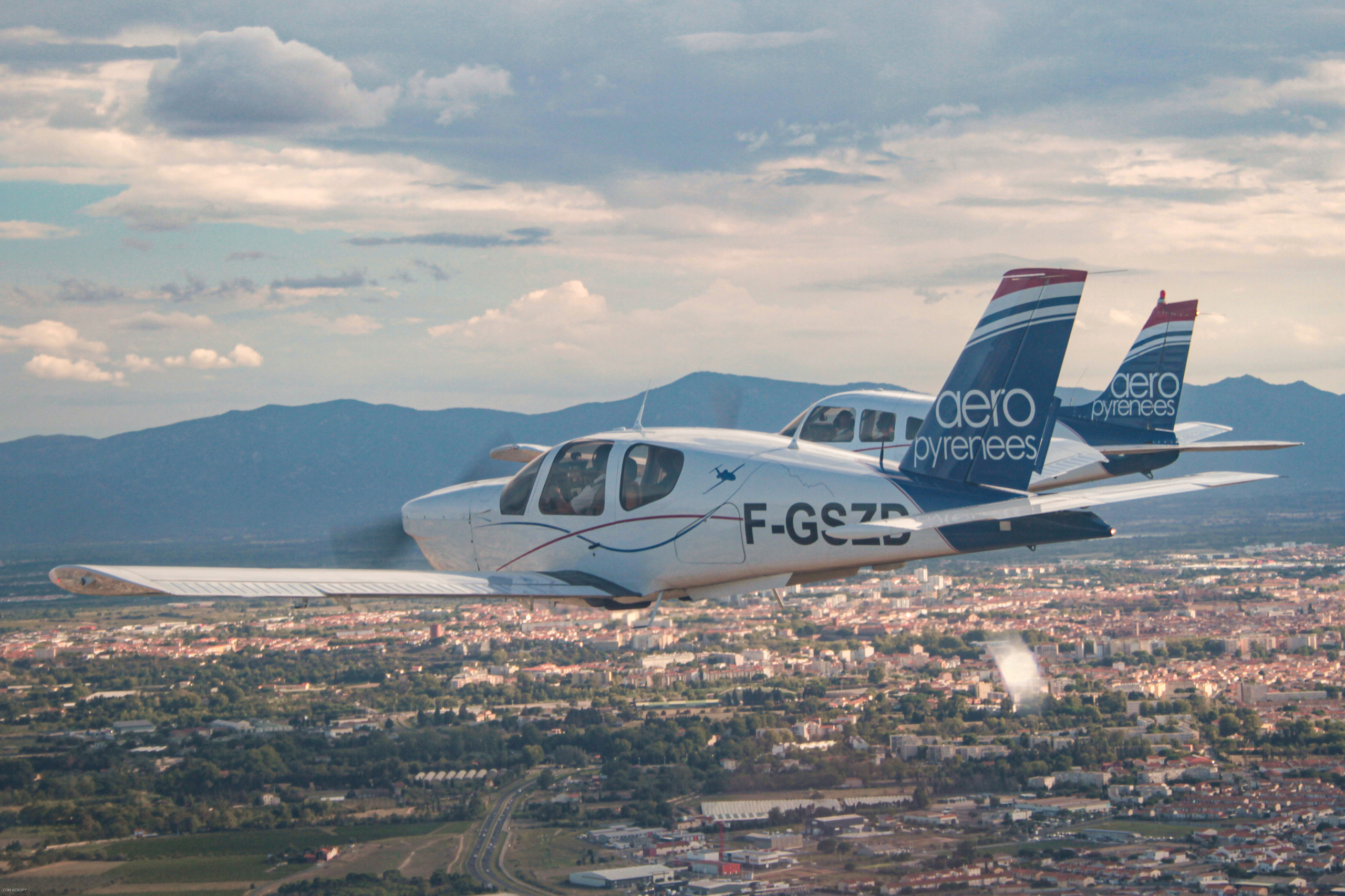 TB20 en formation avec un PA28R